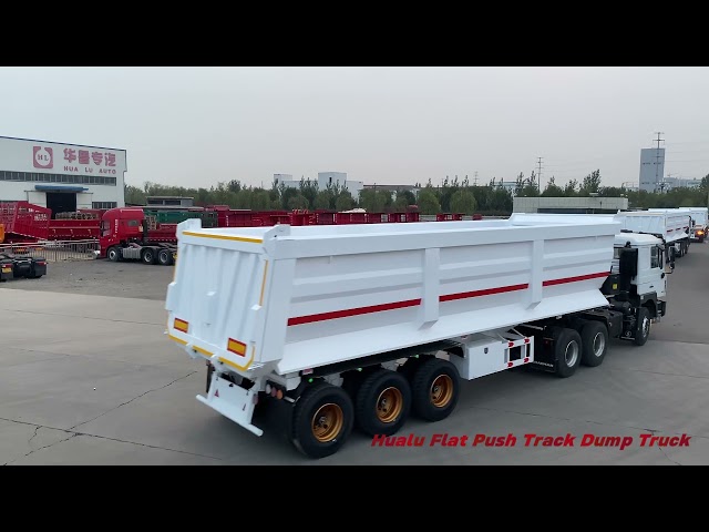 Flat push trash dump truck departs